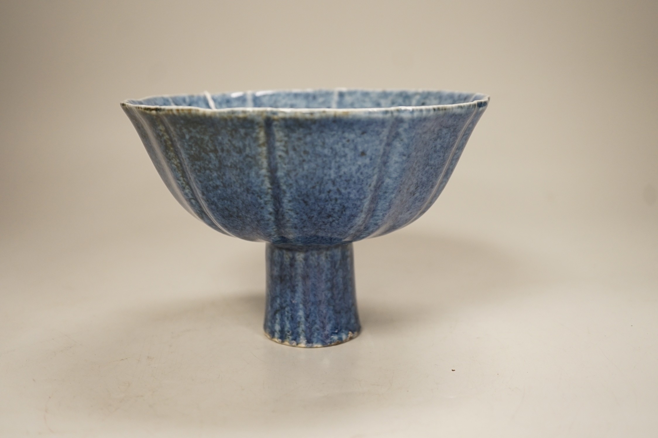 A Chinese powder blue glazed stem cup, 11cm tall